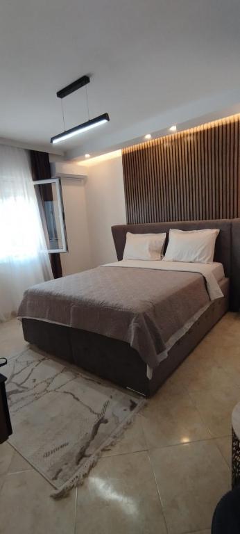 Postel nebo postele na pokoji v ubytování Kahari Apartments
