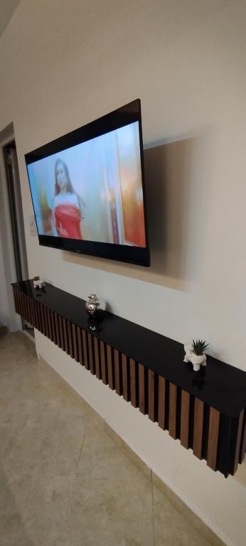 TV a/nebo společenská místnost v ubytování Kahari Apartments