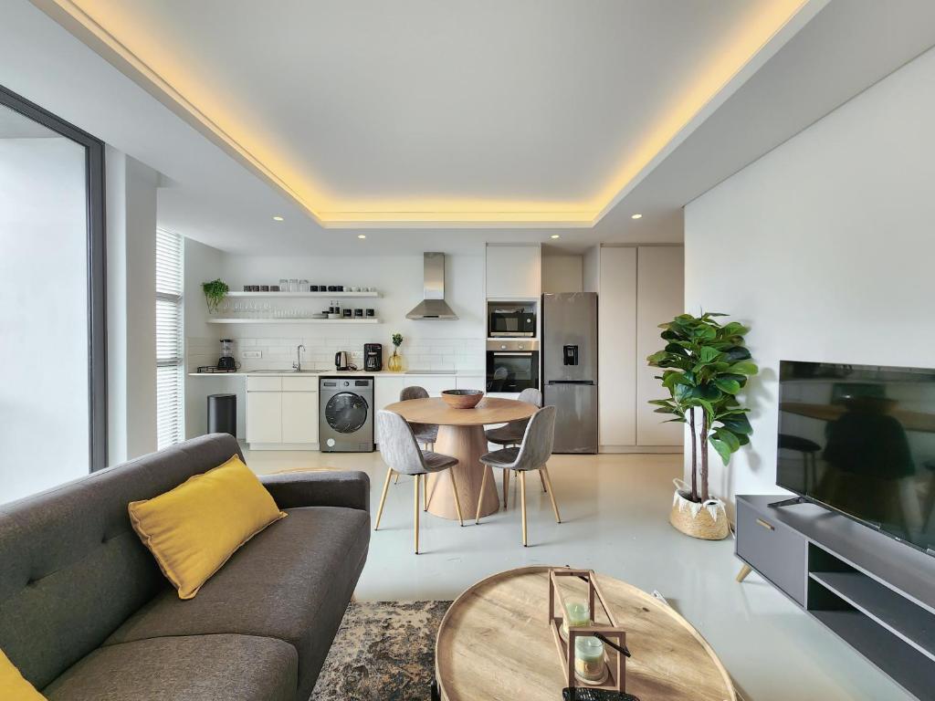Elegant minimalist apartment in vibrant Woodstock Cape Town updated