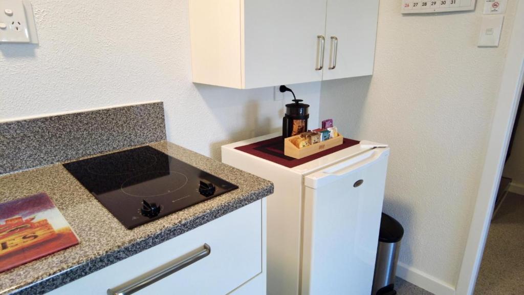 Kuchyň nebo kuchyňský kout v ubytování 554 Moana Court Motel