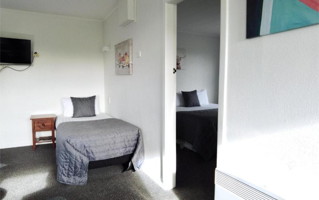 Postel nebo postele na pokoji v ubytování 554 Moana Court Motel