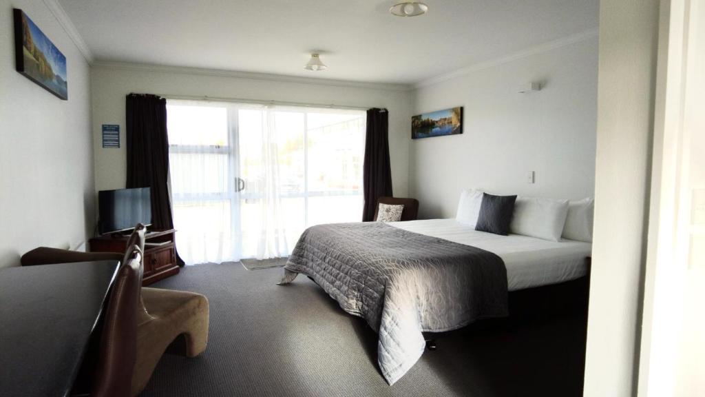 Postel nebo postele na pokoji v ubytování 554 Moana Court Motel