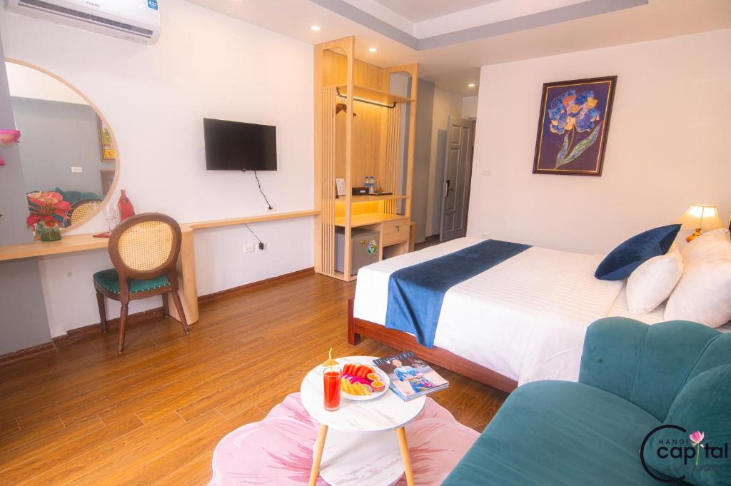 TV a/nebo společenská místnost v ubytování Hanoi Capital Premium Hotel