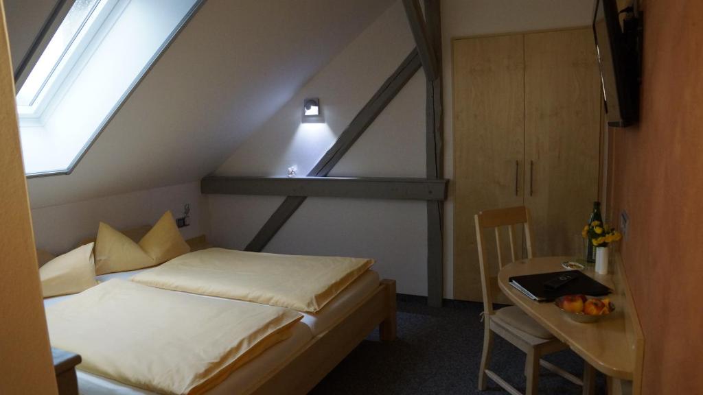 Postel nebo postele na pokoji v ubytování Pension Mühlrad