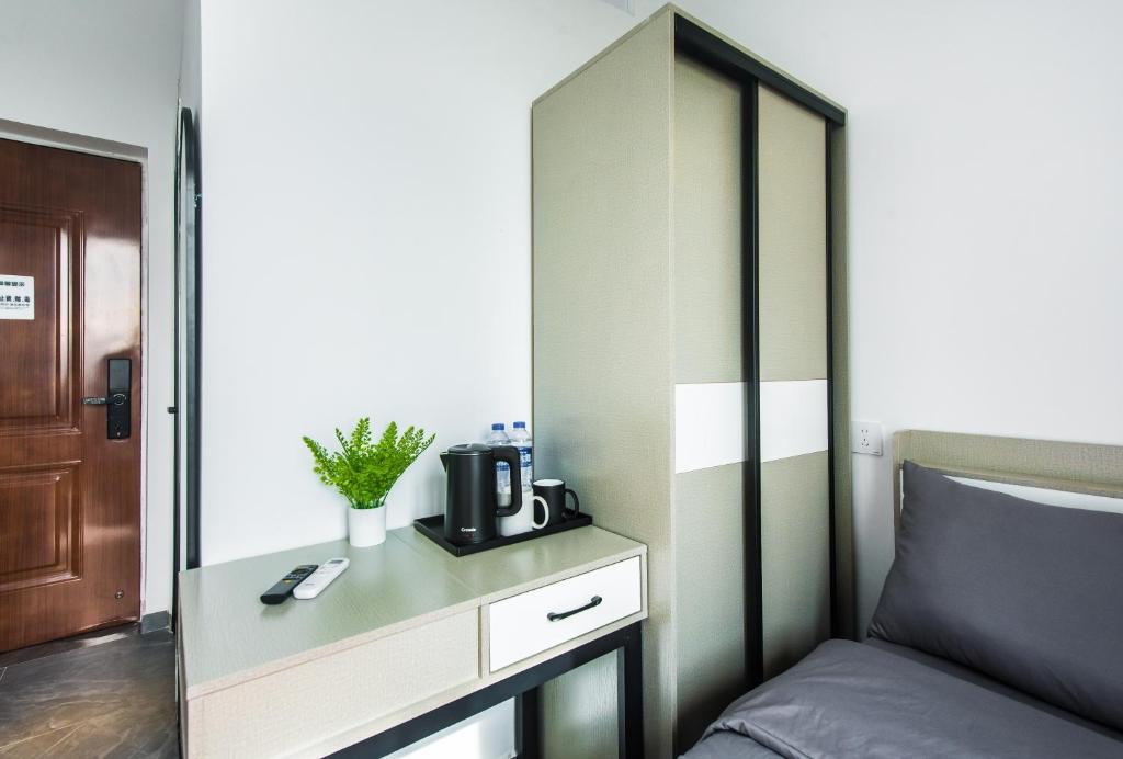 Posezení v ubytování WESU Apartment - Shenzhen Longhua Dalang Fashion Dalang Town Branch