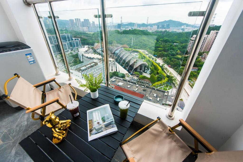 Posezení v ubytování WESU Apartment - Shenzhen Longhua Dalang Fashion Dalang Town Branch