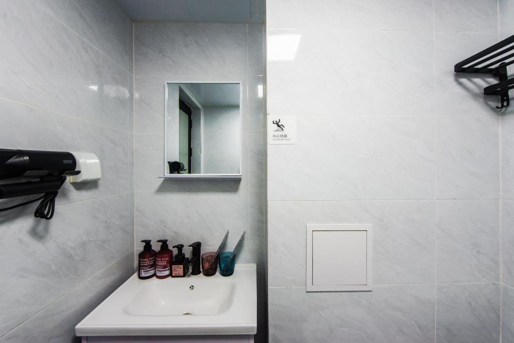 Koupelna v ubytování WESU Apartment - Shenzhen Longhua Dalang Fashion Dalang Town Branch