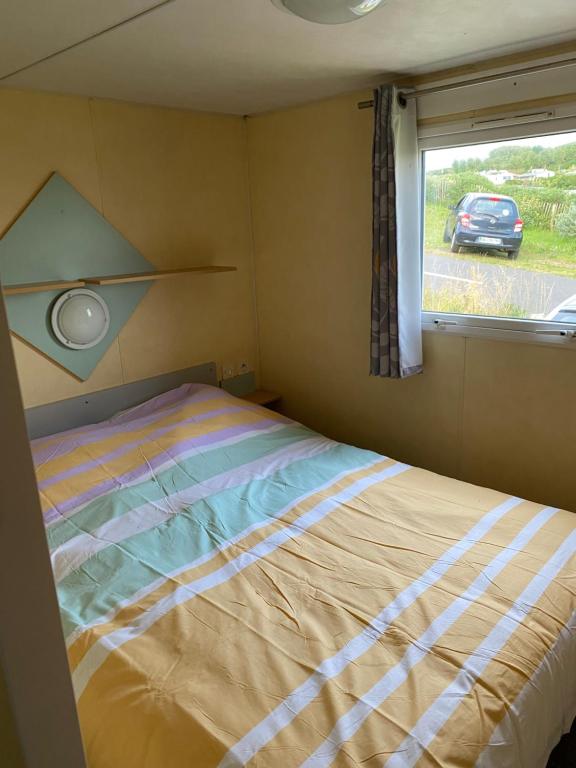 Postel nebo postele na pokoji v ubytování Calme proche de la mer