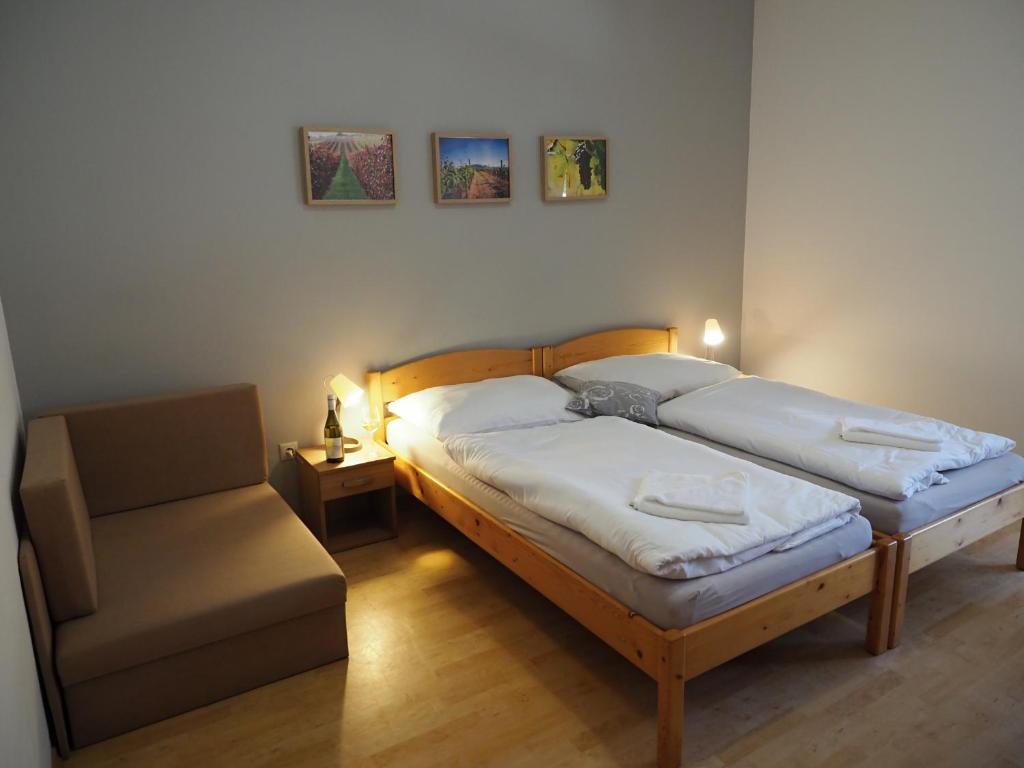 Postel nebo postele na pokoji v ubytování Resort Zajíci ze Zaječí