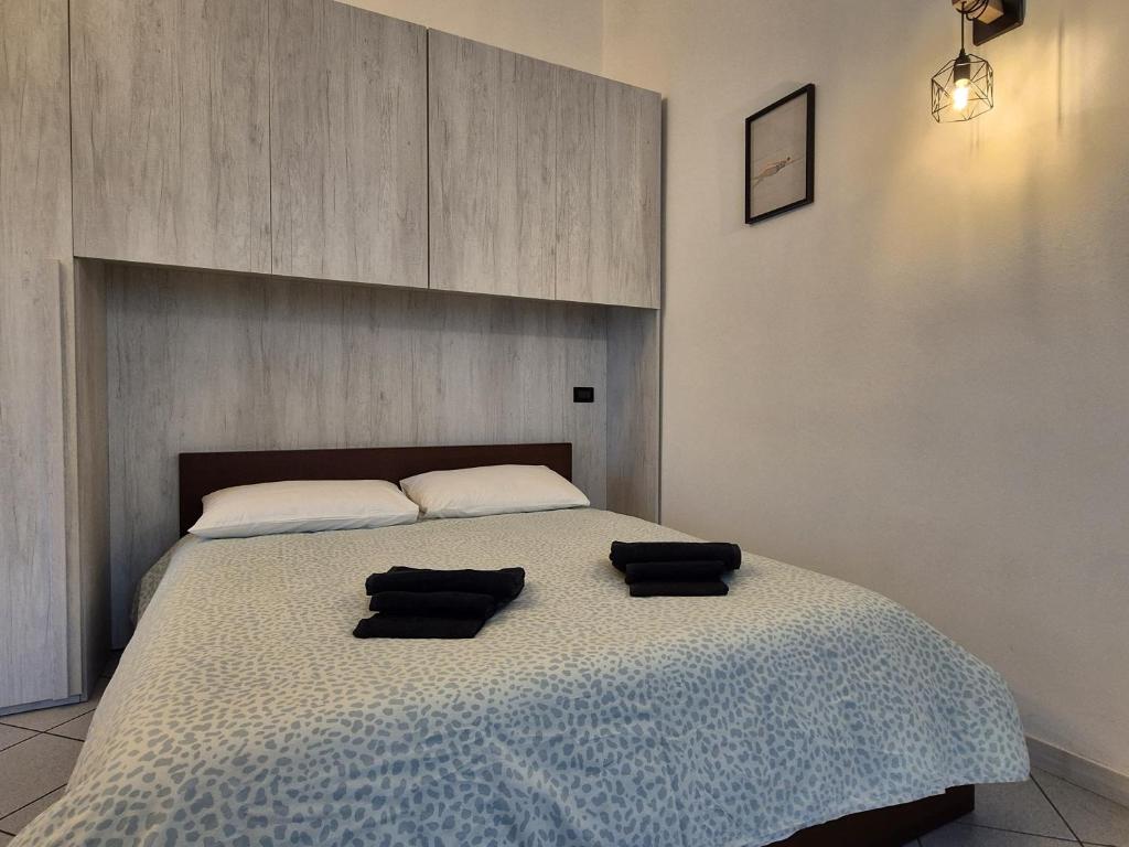 Postel nebo postele na pokoji v ubytování Casa Stile Libero 40 Arcore FS-GP Monza-Milano-Lecco