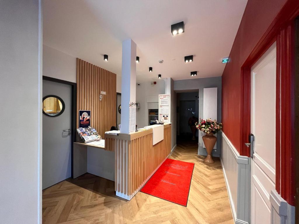 Kuchyň nebo kuchyňský kout v ubytování Hotel Angleterre