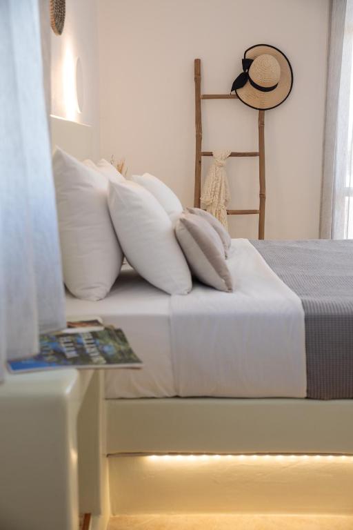 Posteľ alebo postele v izbe v ubytovaní Maria's Rooms & Studios