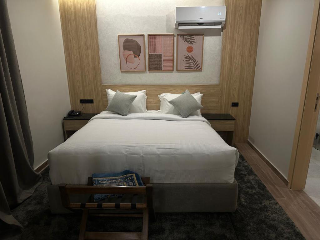 Postel nebo postele na pokoji v ubytování Lacasa Residence