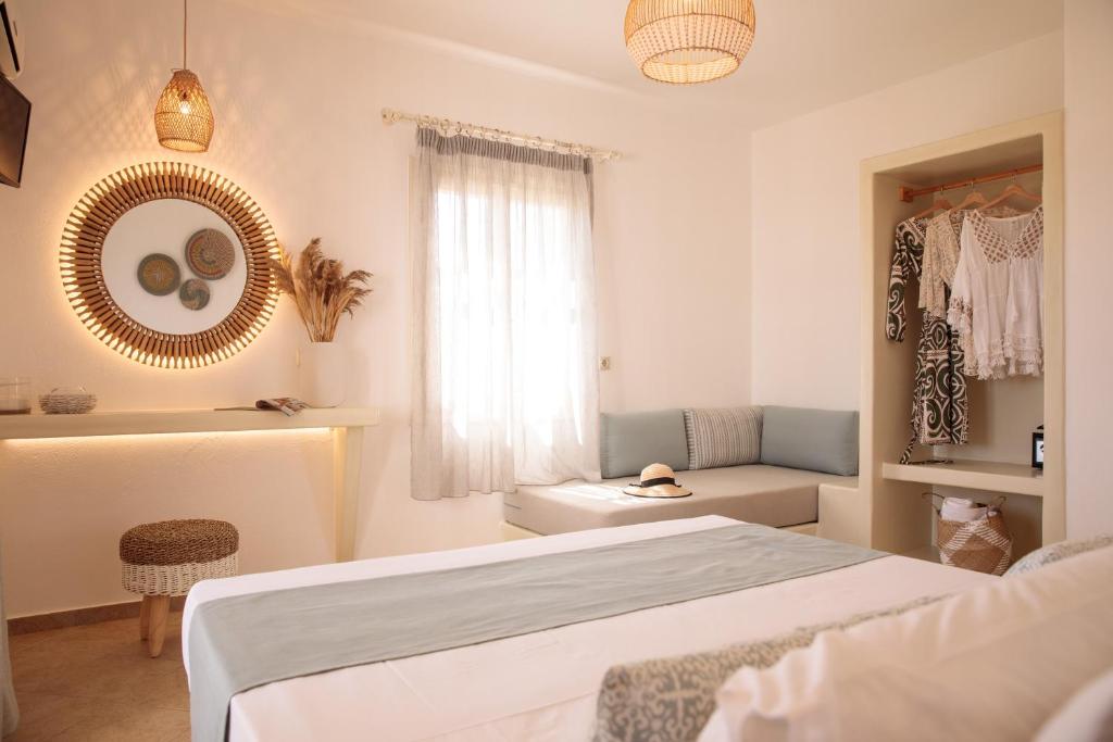 Posteľ alebo postele v izbe v ubytovaní Maria's Rooms & Studios