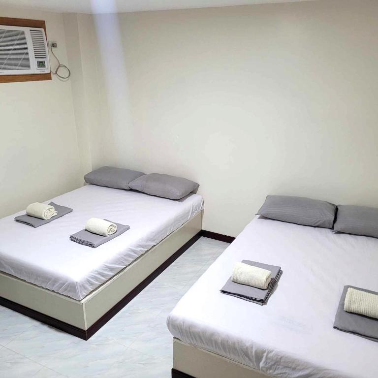 Postel nebo postele na pokoji v ubytování Borj Hotel