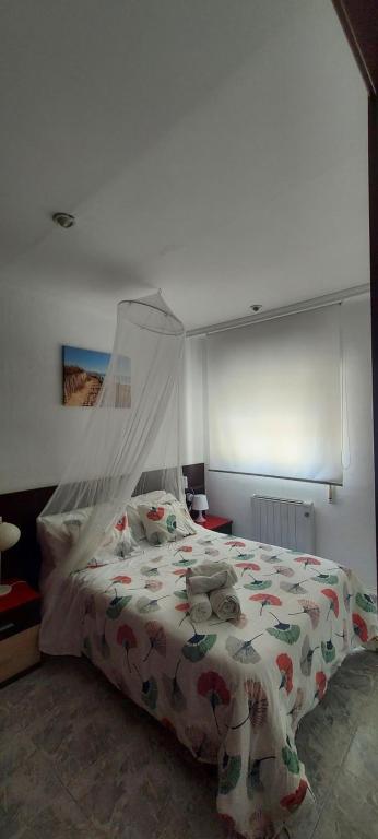 Posteľ alebo postele v izbe v ubytovaní Oasis de Playa O Grove