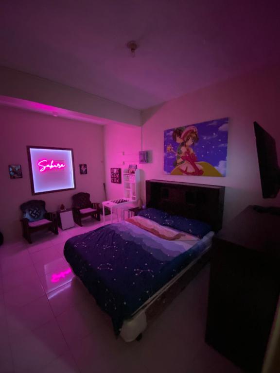 Ένα ή περισσότερα κρεβάτια σε δωμάτιο στο Valenzuela Staycation Netflix and chill