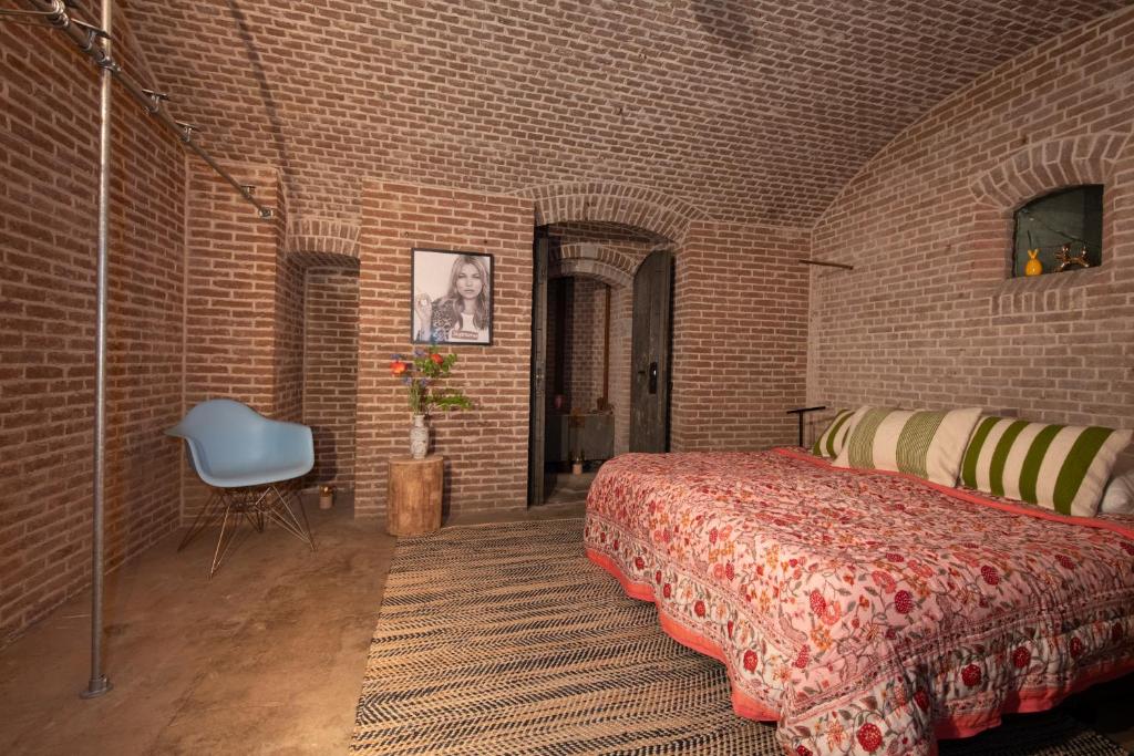 Postel nebo postele na pokoji v ubytování Fort Vuren