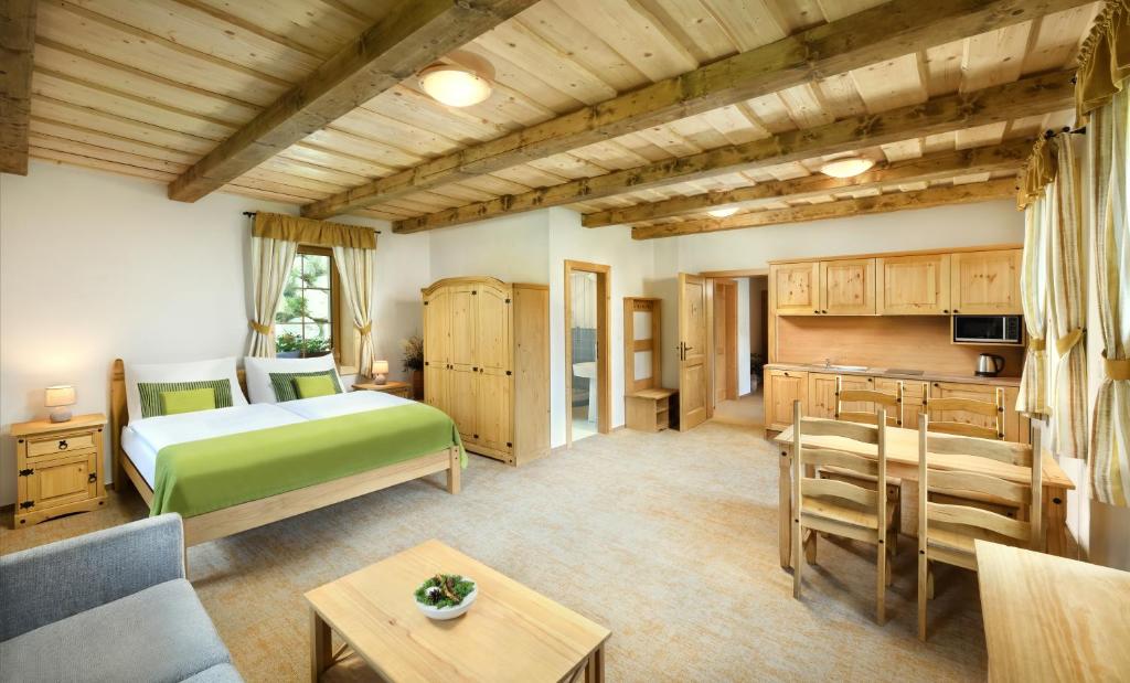 Postel nebo postele na pokoji v ubytování Apartmány a Štúdiá Lúčky, SKI-IN SKI-OUT ,Chopok Jasná, Demänovská dolina