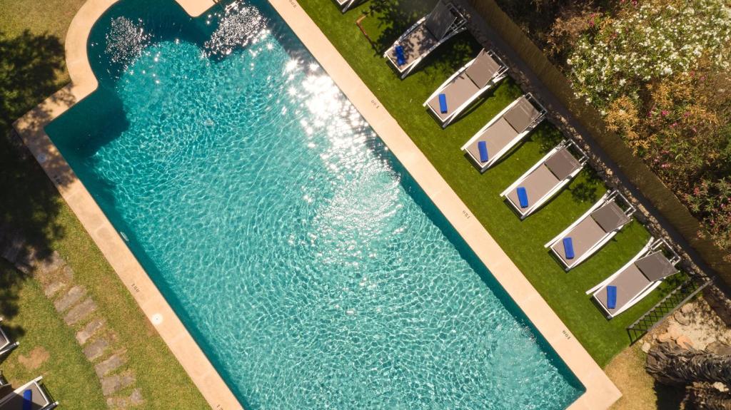 an overhead view of a swimming pool in a resort at Virrey Finca Hotel in Inca