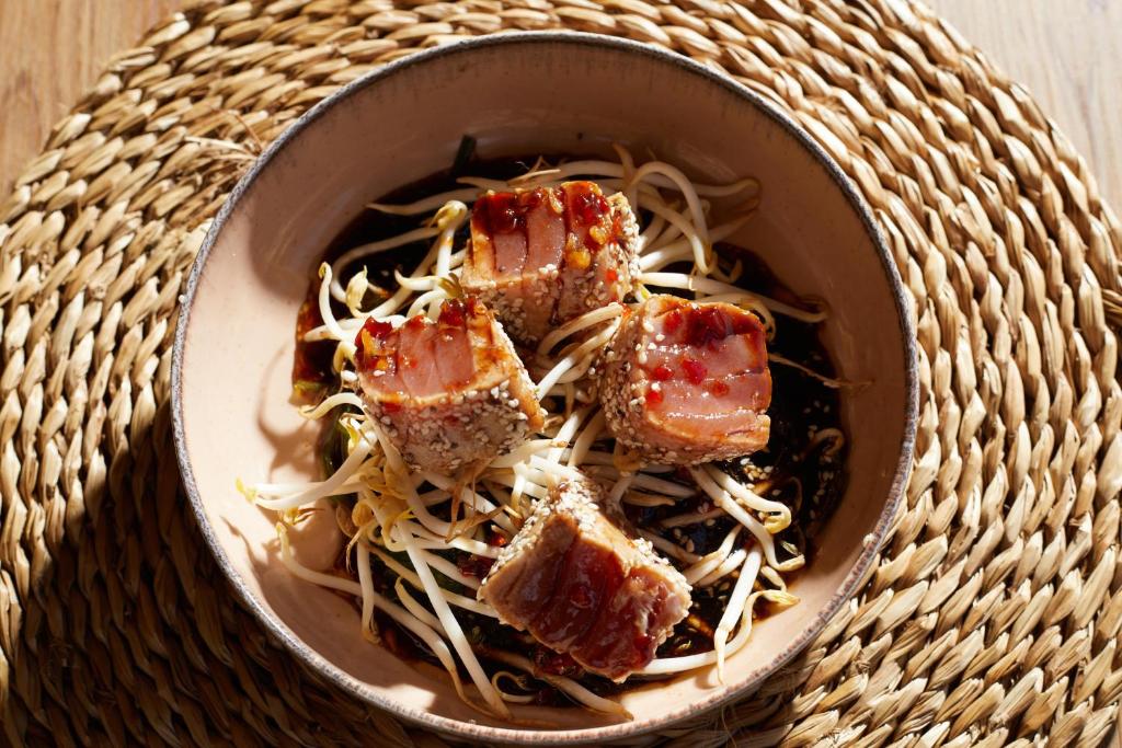 a bowl of food with meat and noodles in it at Virrey Finca Hotel in Inca