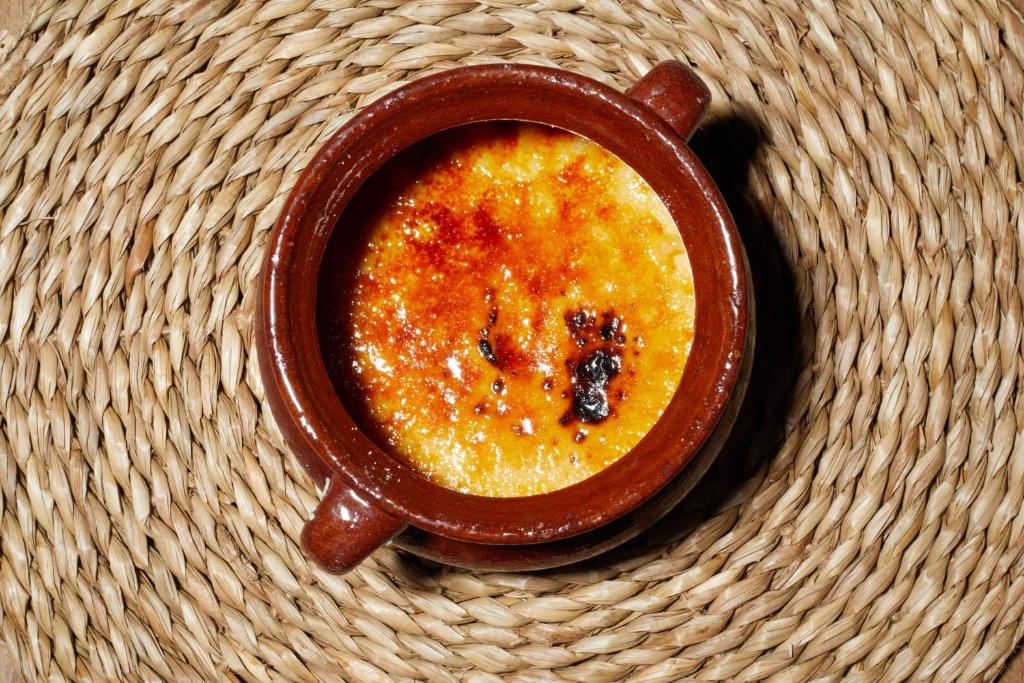 a cup of coffee sitting on top of a basket at Virrey Finca Hotel in Inca