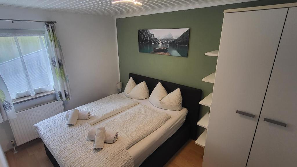 Postel nebo postele na pokoji v ubytování Chalet Charlotte Apartments