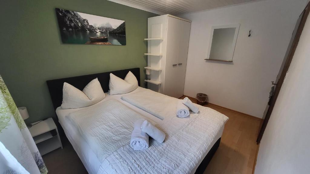 Postel nebo postele na pokoji v ubytování Chalet Charlotte Apartments