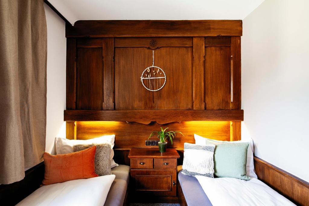Postel nebo postele na pokoji v ubytování PineTree Lodge Mayrhofen