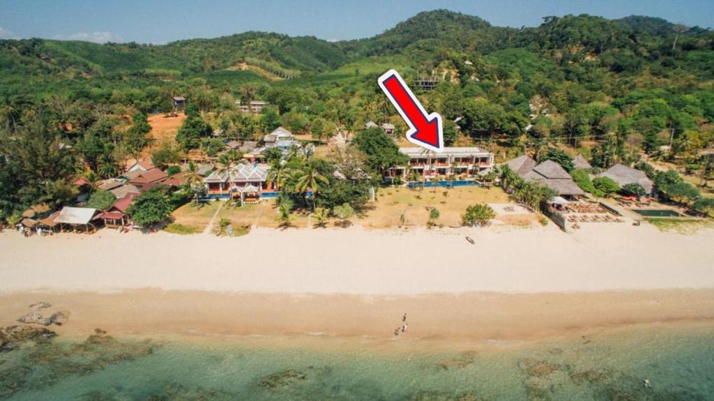 an aerial view of a resort on a beach at Beachfront! 2 Bedroom Apartment A3 - 110 Sqm in Ko Lanta