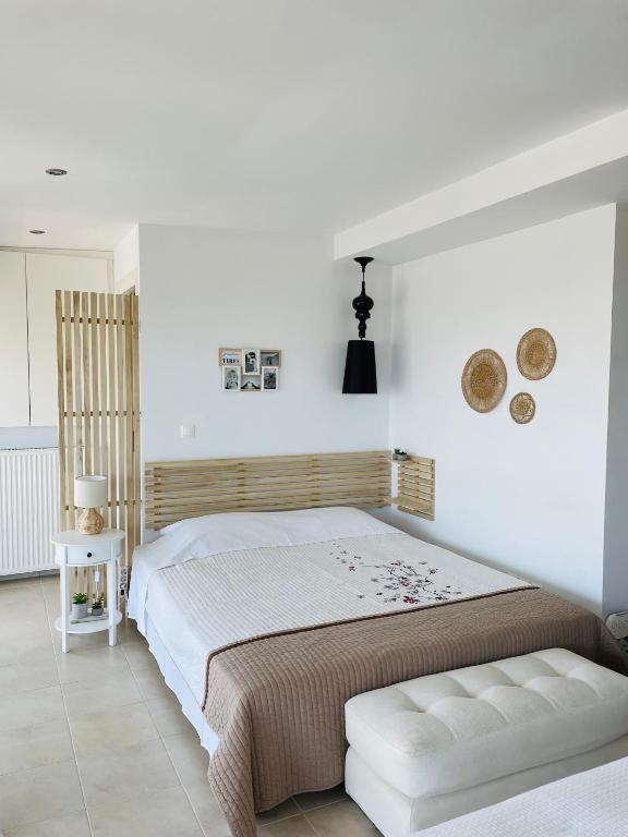 Postel nebo postele na pokoji v ubytování Sea View Luxury Studio Palaio Faliro