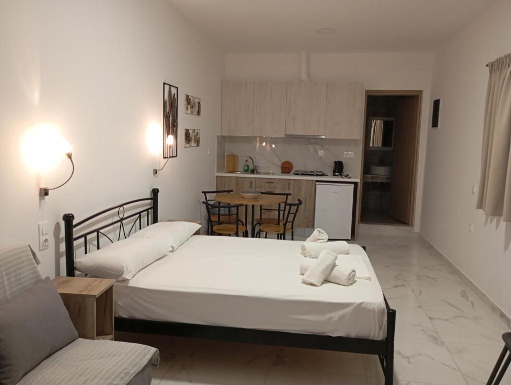 Postel nebo postele na pokoji v ubytování Creta Sun Apartments