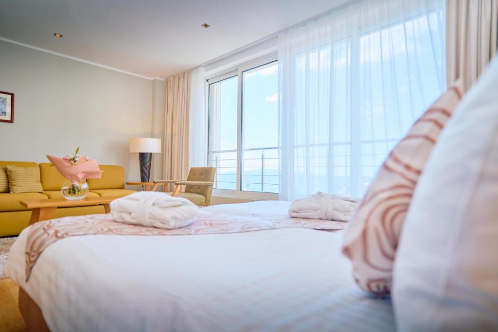 Postel nebo postele na pokoji v ubytování ASTORIA Hotel Opatija