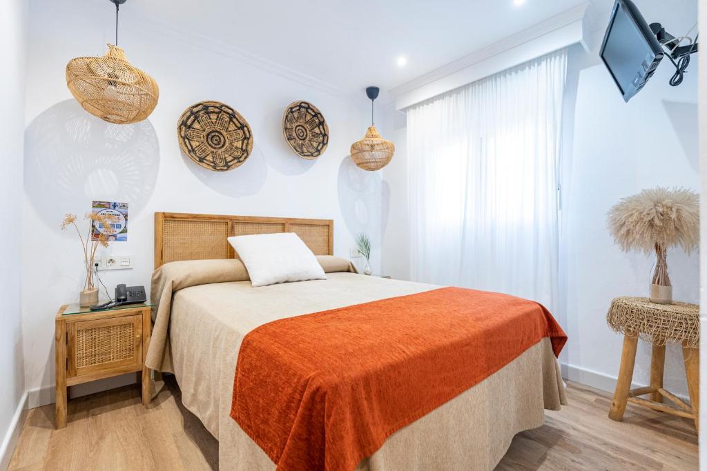 Cama o camas de una habitación en Hotel Las Américas