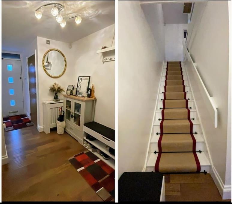 a staircase in a room with a stair case at Cozy and warm family home in South Norwood