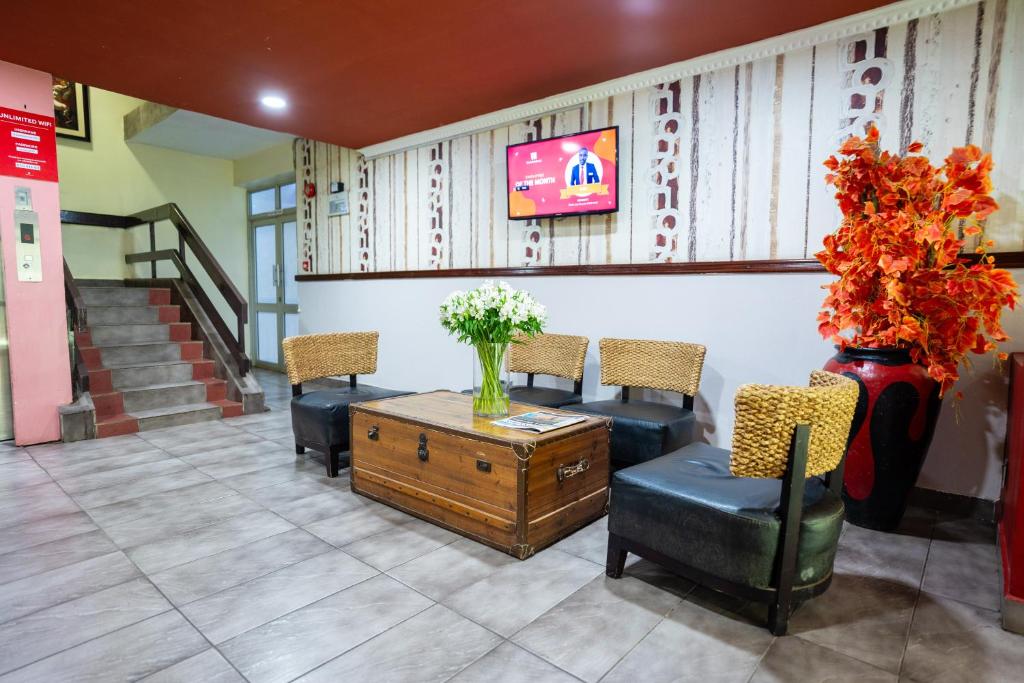 TV a/nebo společenská místnost v ubytování Hadassah Hotel