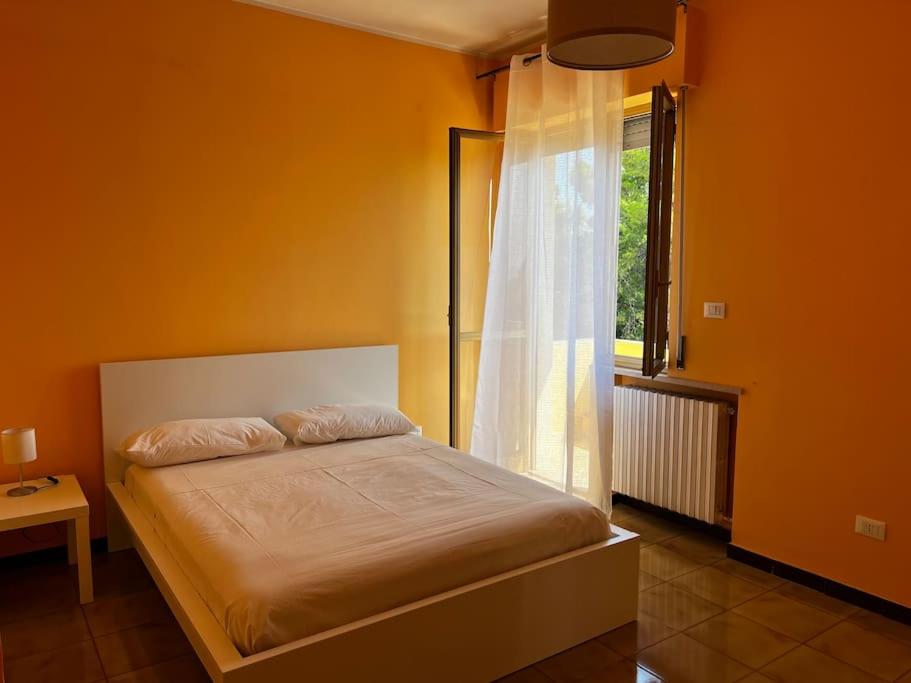 A bed or beds in a room at Appartamento sul mare