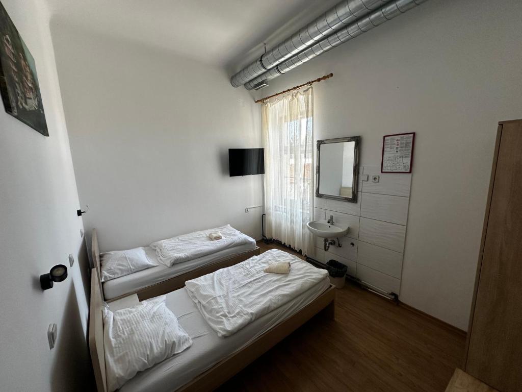 Postel nebo postele na pokoji v ubytování Guesthouse Pri Tonetu