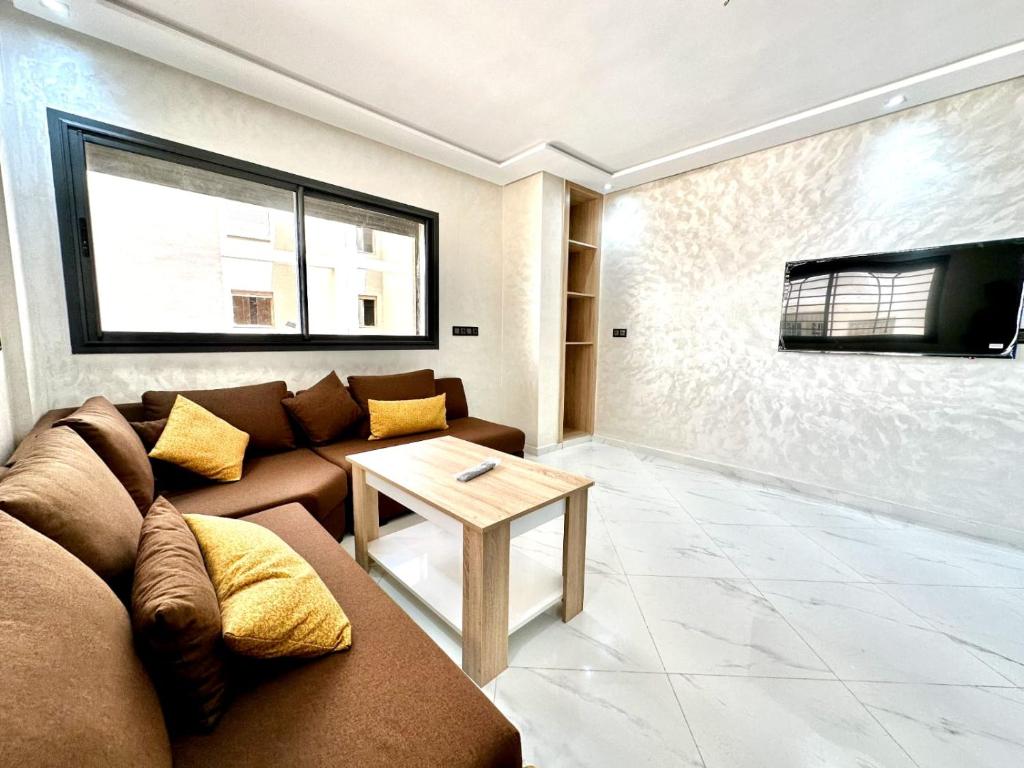 TV a/nebo společenská místnost v ubytování appartment igar azougagh elhoceima