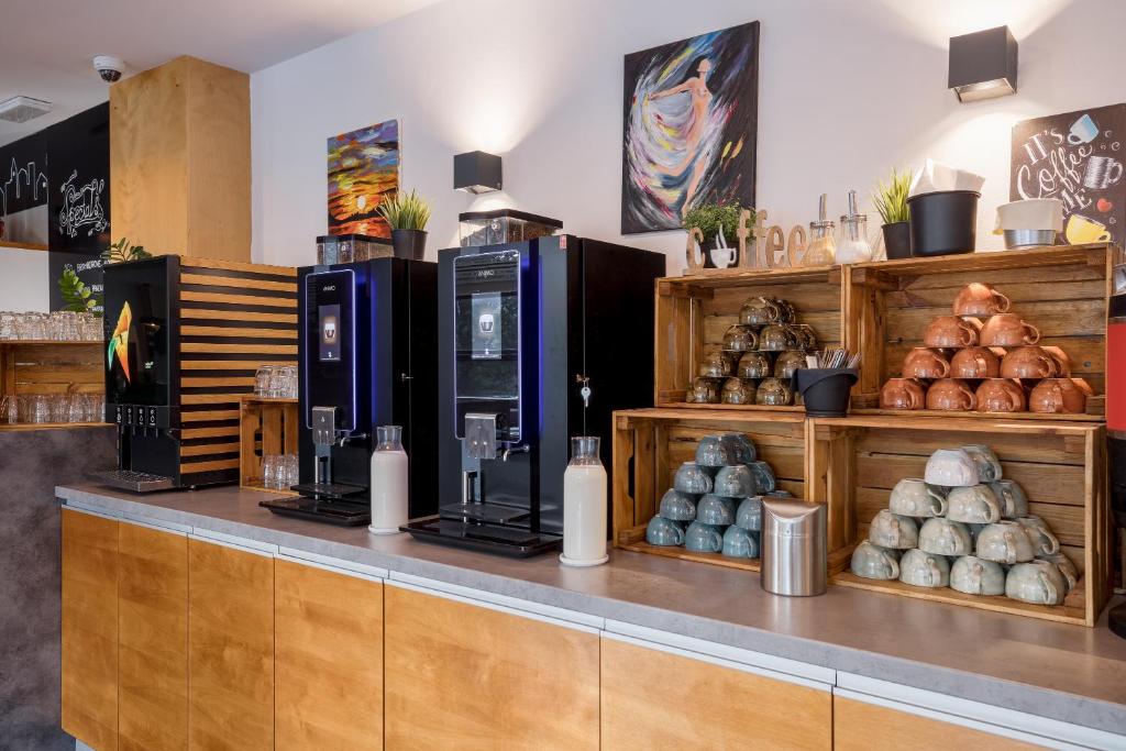 Příslušenství pro přípravu čaje a kávy v ubytování Hotel Vista