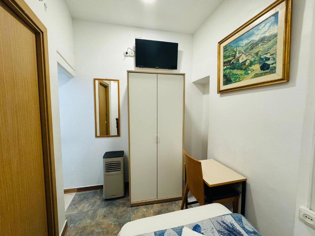 TV a/nebo společenská místnost v ubytování Hostal Mont Thabor