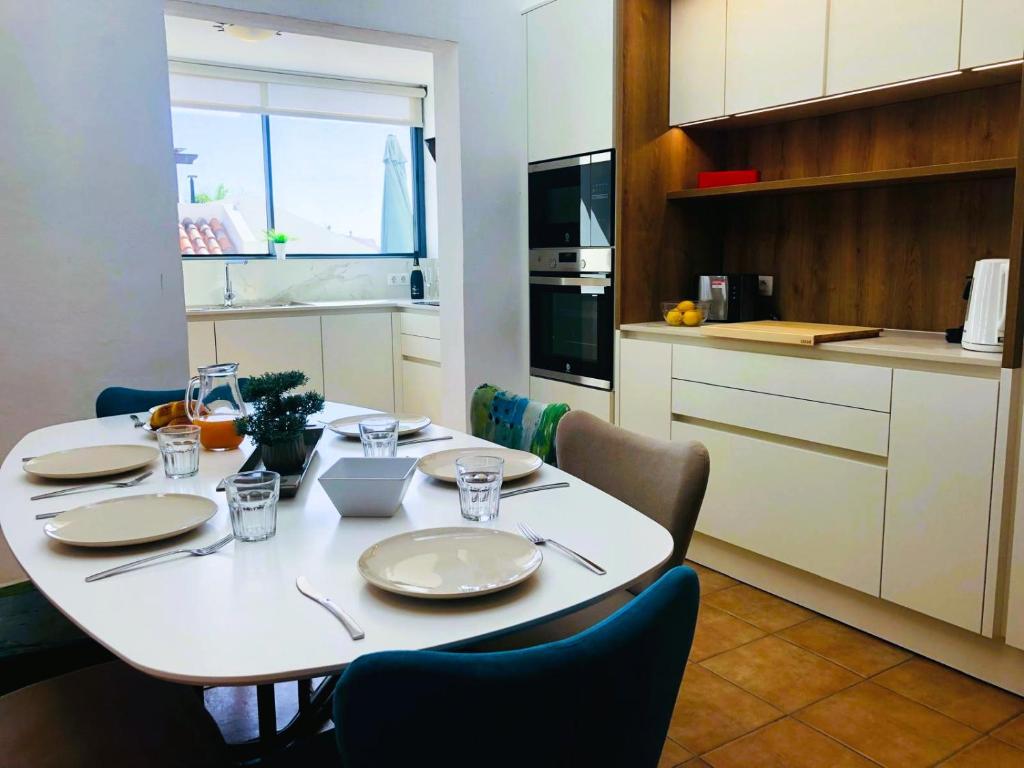 A kitchen or kitchenette at Casa Piscis