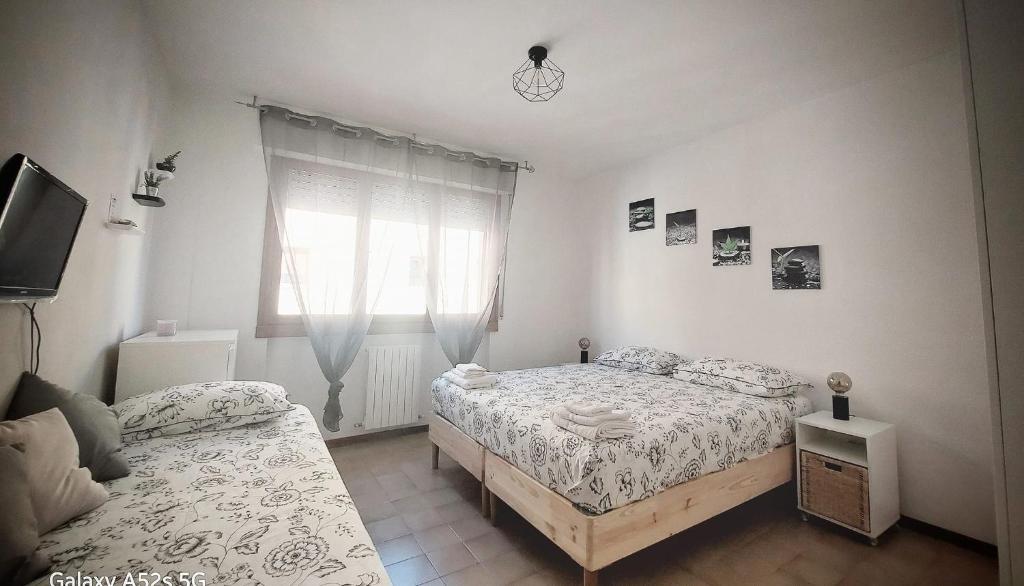 Postel nebo postele na pokoji v ubytování Le2sorelle