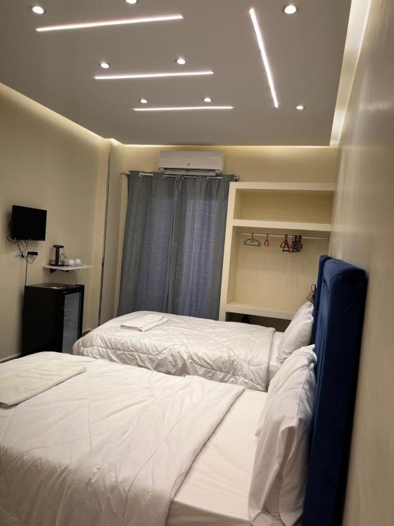 Letto o letti in una camera di Moses Pyramids Inn