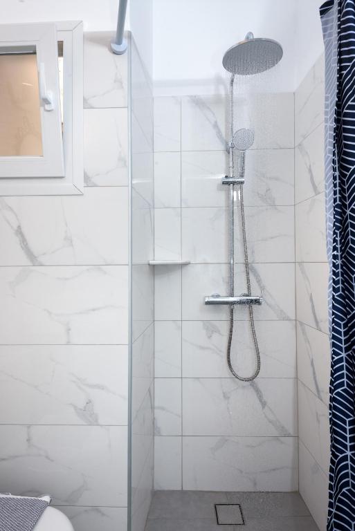 Kúpeľňa v ubytovaní Aratos Hotel
