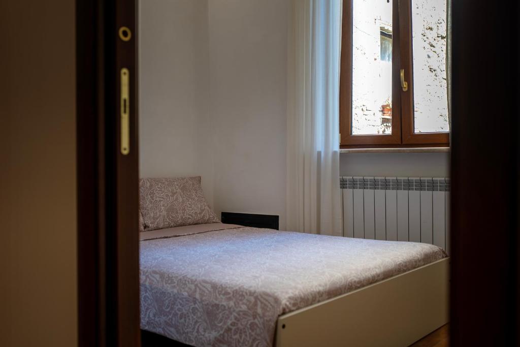Postel nebo postele na pokoji v ubytování Sleeping in Orte Apartments