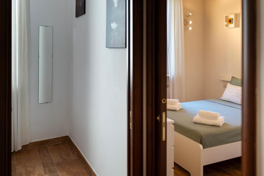 Postel nebo postele na pokoji v ubytování Sleeping in Orte Apartments
