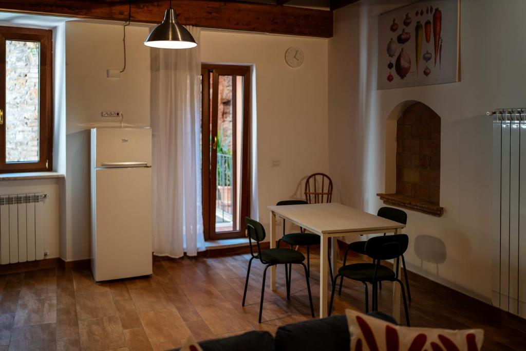Kuchyň nebo kuchyňský kout v ubytování Sleeping in Orte Apartments