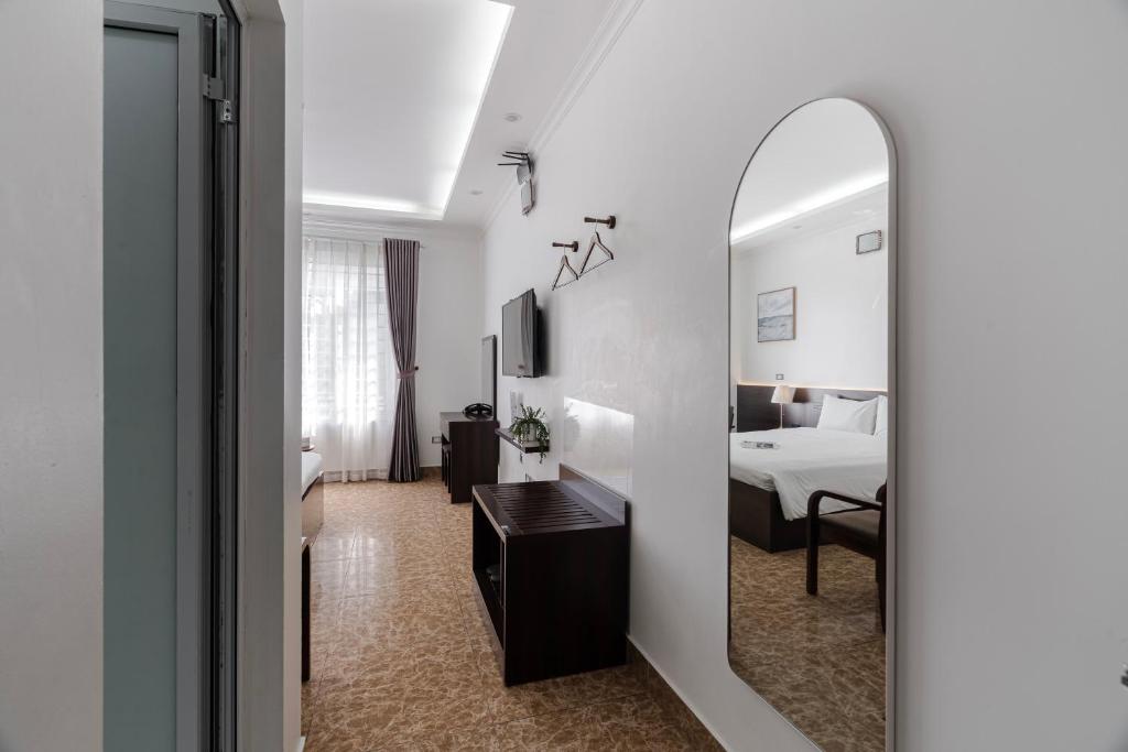 Postel nebo postele na pokoji v ubytování 그레이스 호텔 Grace Hotel & Residence