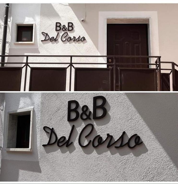 a building with a sign that says bc bella colosa at B&b Del Corso in Mandatoriccio